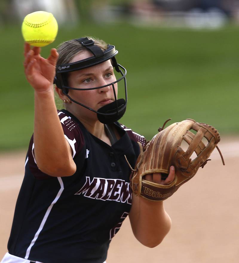 Marengo's Elizabeth White throw to first base during a Kishwaukee River Conference softball game against Richmond-Burton on Monday, May 12, 2025, at Richmond-Burton High School in Richmond.